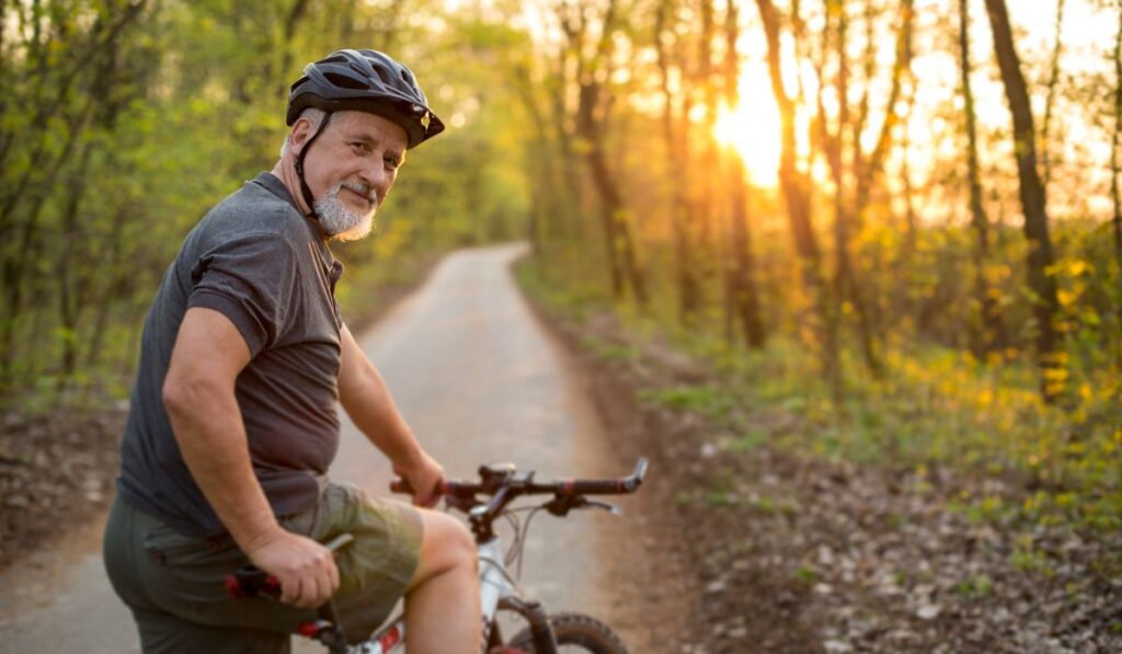 Senior man on his mountain bike outdoors