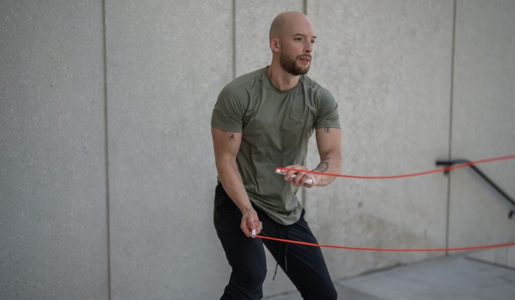 man doing skipping rope exercises