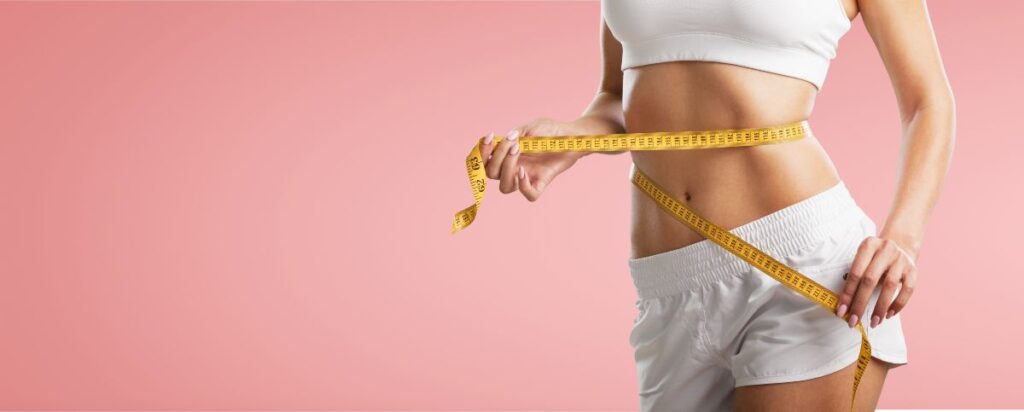 Woman with measure. NAD injections for weight loss